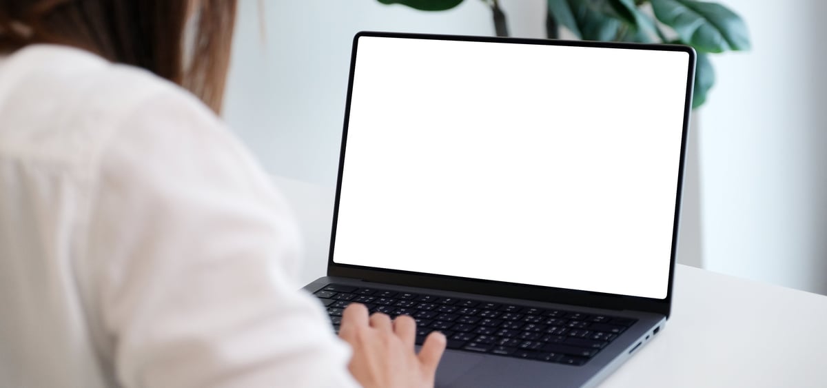 Woman creating content on laptop