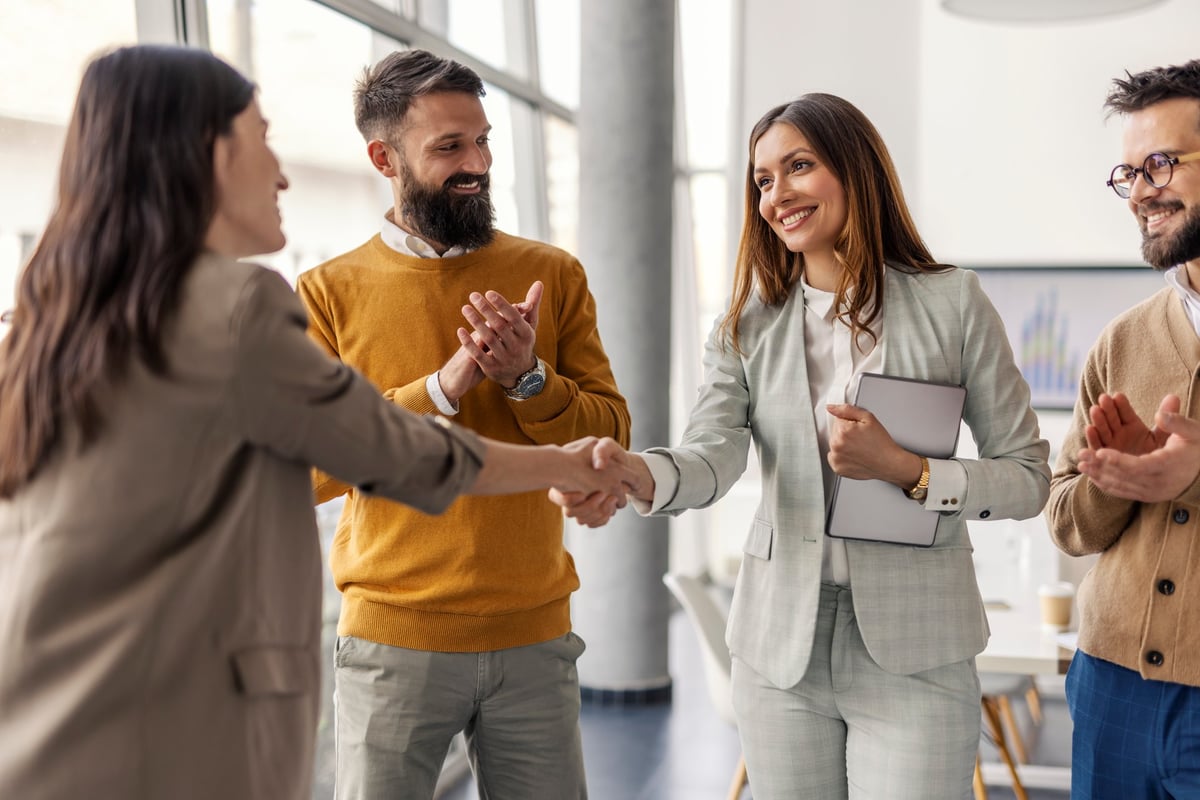 Professional business partnership handshake